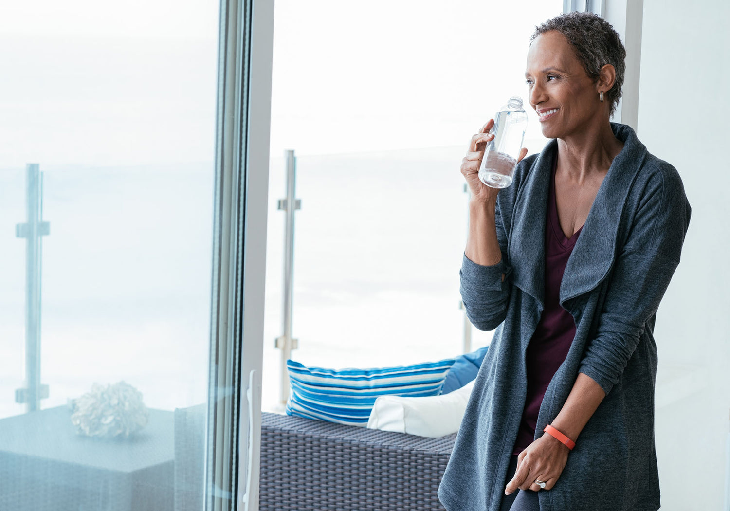 woman drinking water from a water bottle