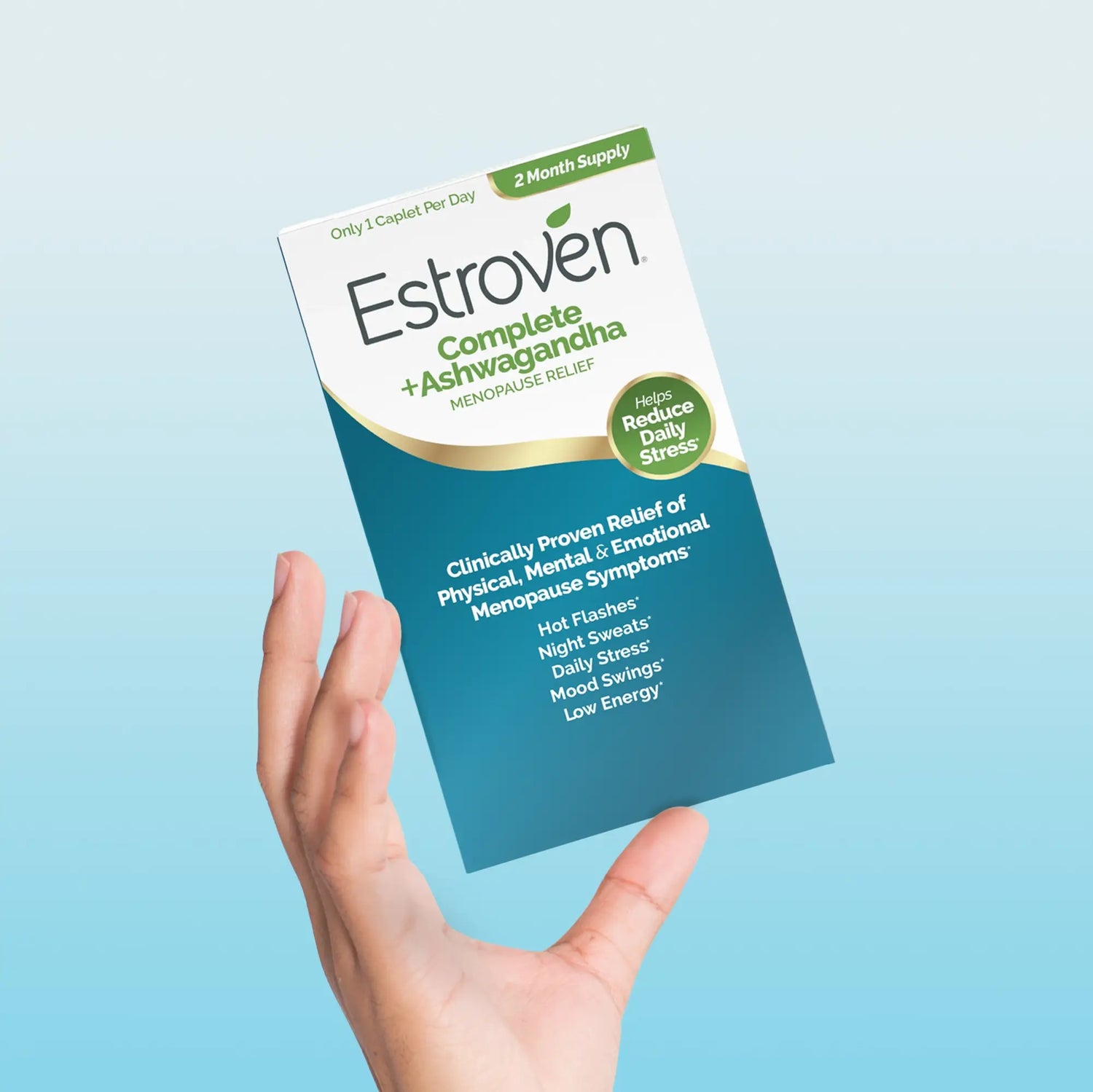 hand holding up box of Estroven Complete Ashwagandha
